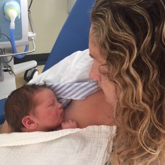 Jemma holds Casper for the first time