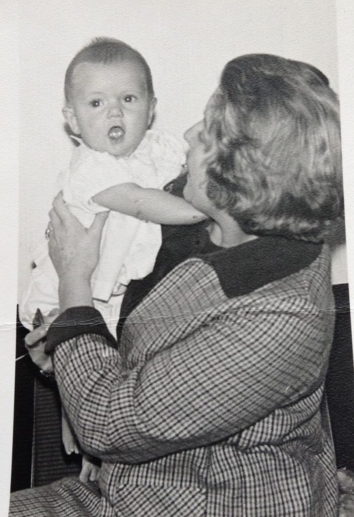 A black and white photo of Sean as a baby, being held by a woman who was Helen's friend