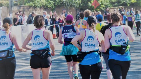 Four runners in CLAPA vests