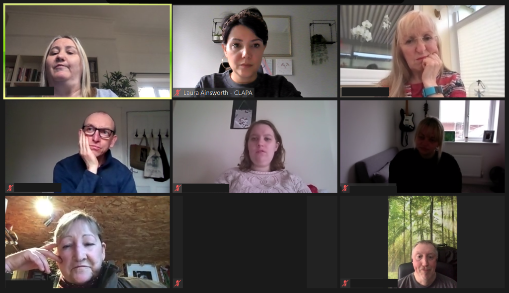 A screenshot of a zoom meeting with nine people in a grid